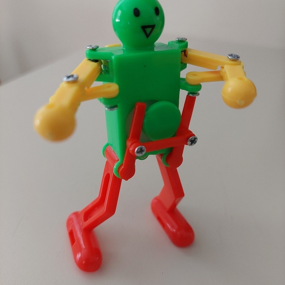 3.5" Fun Wind-up Dancing Walking Robot Toy Red Green and Yellow. Makes a great - Picture 8 of 11